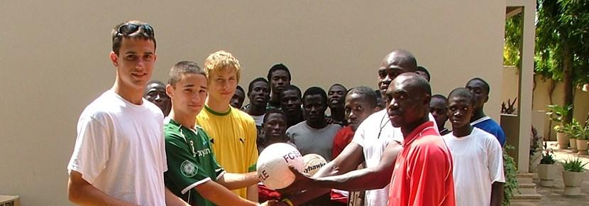 Volunteers Coach a Soccer Team Overseas with Projects Abroad Volunteers coach soccer at a school abroad on the Sports project