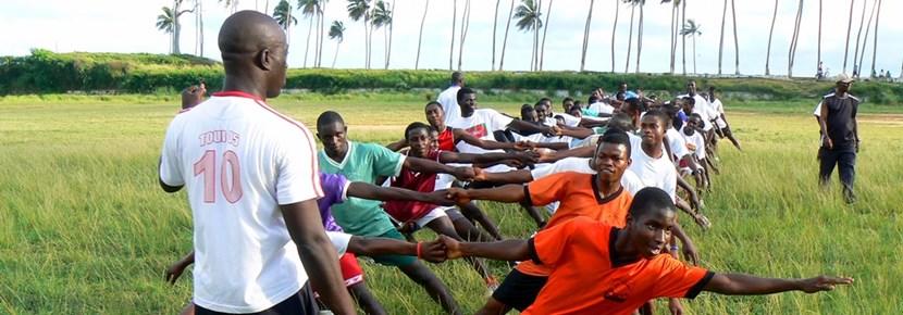 Volunteer Coaches Rugby Team at a School in India School rugby practice with volunteer coach in Ghana